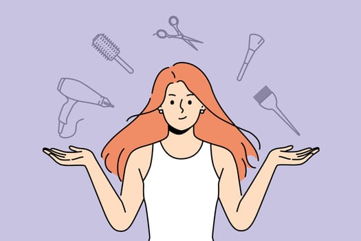 Woman stylist with flying accessories for hairdresser offers to make new hairstyle to change image. Girl hairdresser from beauty salon recommends taking care of hair and using professional equipment