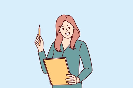 Woman is holding notepad and pen recommending job plan for successful completion of deadlines. Woman teacher at school with smile gives children quality education and prepares for exams
