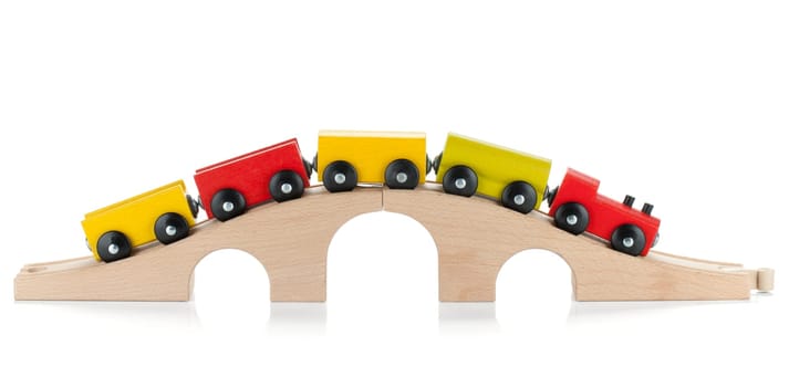 Wooden toy colored train. Isolated on white background