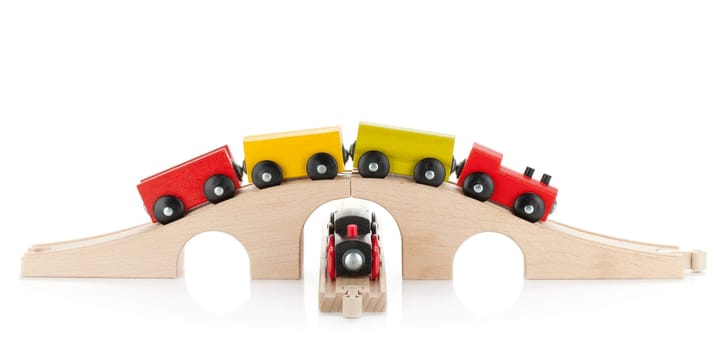 Wooden toy trains. Isolated on white background