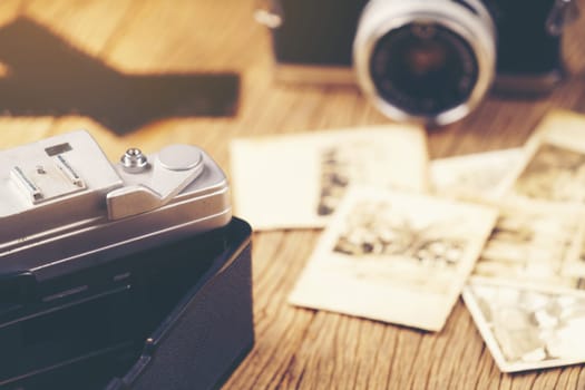 vintage camera on the background of old photos