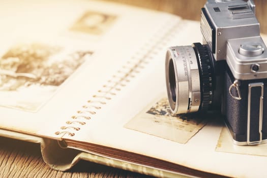 vintage camera on the background of old photos