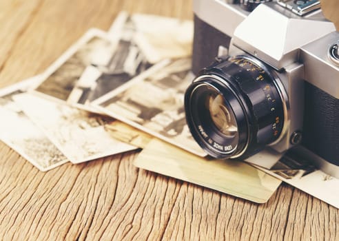 vintage camera on the background of old photos
