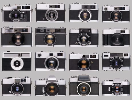 vintage old film camera collection isolated on gray background