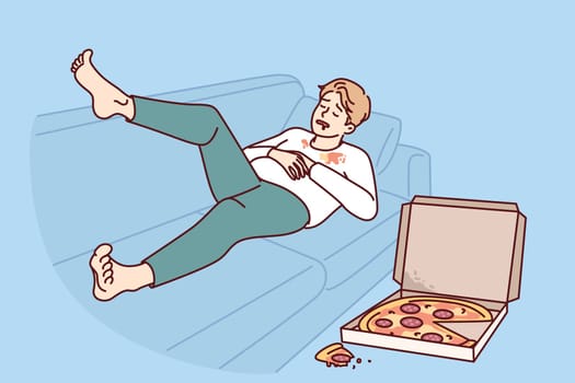 Ugly fat man sleeping on sofa near pizza box for wrong lifestyle concept of obesity causing. Guy suffering from problem of obesity needs help of nutritionist and eating healthy diet food.