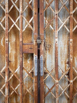 Retro folding steel door for exterior home decoration texture and background in Thai and Asian traditional style . space for text