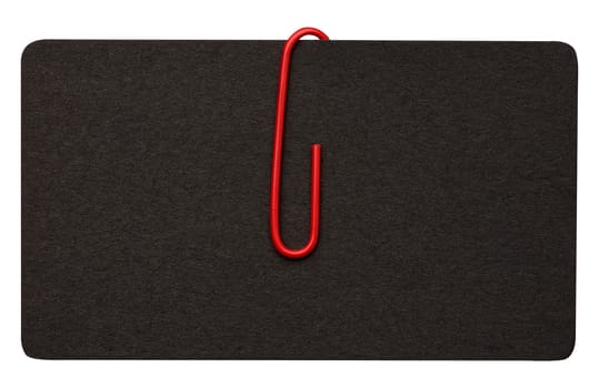Black paper cardboard business card and red metal paper clip on a white background