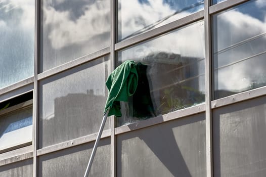 window washing, washing a street shop window. High quality photo