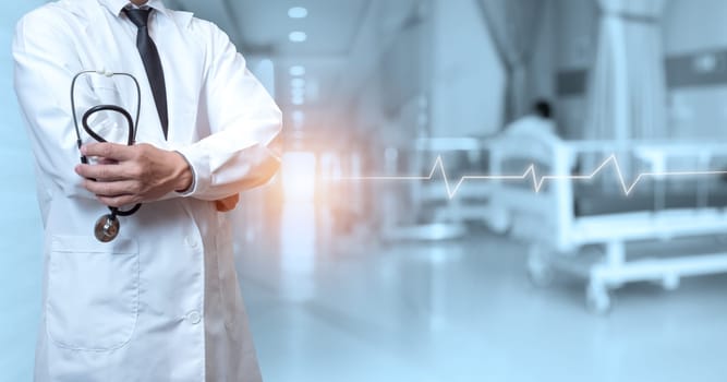 Doctor in lab coat with arms crossed on hospital interior background. Medical concept. Medical information search concept. Disease treatment concept. insurance concept.