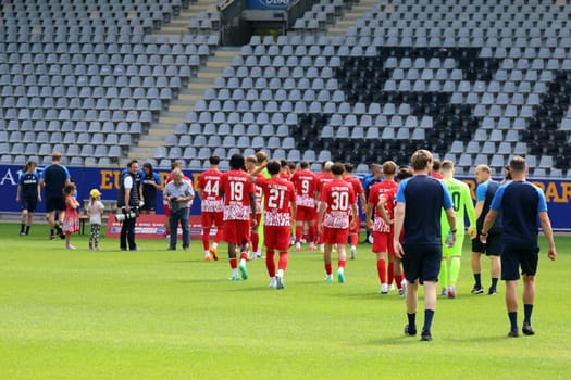 Players and functional team of SC Freiburg II/U23 on their way to the team photo SC Freiburg II - U23 - Season 2023/24 -