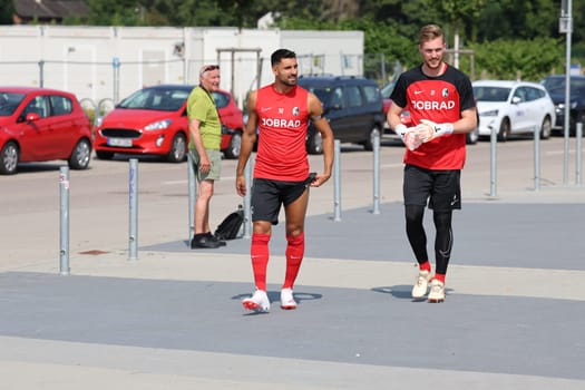 Vincenzo Grifo (SC Freiburg) and goalkeeper Florian Müller (SC Freiburg) on their way to the start of training Bundesliga club SC Freiburg 2023  DFL REGULATIONS PROHIBIT ANY USE OF PHOTOGRAPHS AS IMAGE SEQUENCES AND/OR QUASI-VIDEONann  Photo: Joachim Hahne/johapress