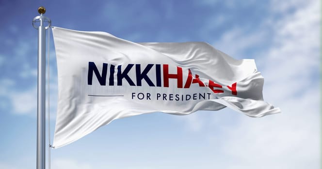 Washington D.C., US, June 15 2023: Nikki Haley 2024 presidential election campaign flag waving in the wind on a clear day. Illustrative editorial 3d illustration render