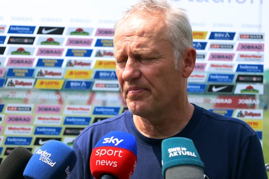 Sought-after interview partner: Coach Christian Streich (SC Freiburg) after the first training session at the start of training for Bundesliga club SC Freiburg 2023  DFL REGULATIONS PROHIBIT ANY USE OF PHOTOGRAPHS AS IMAGE SEQUENCES AND/OR QUASI-VIDEONann  Photo: Joachim Hahne/johapress