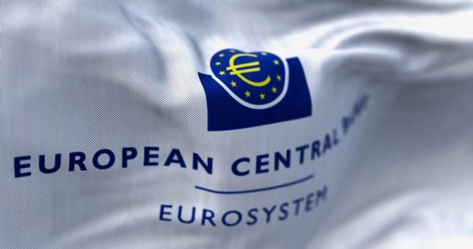 Frankfurt, DE, June 28 2023: Close-up of the European Central Bank flag waving in the wind. Illustrative editorial 3d illustration render. Selective focus