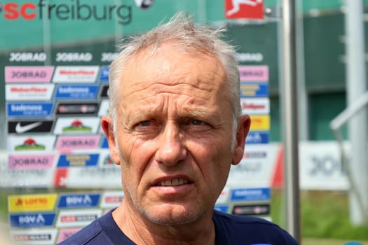 Sought-after interview partner: Coach Christian Streich (SC Freiburg) after the first training session at the start of training for Bundesliga club SC Freiburg 2023  DFL REGULATIONS PROHIBIT ANY USE OF PHOTOGRAPHS AS IMAGE SEQUENCES AND/OR QUASI-VIDEONann  Photo: Joachim Hahne/johapress