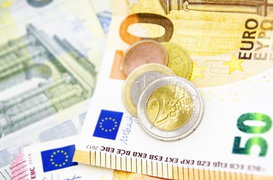 Euro coins and banknotes. Finance and savings in the European Union