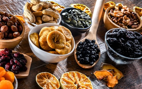 Composition with a variety of dried fruits and assorted nuts. Delicacies.