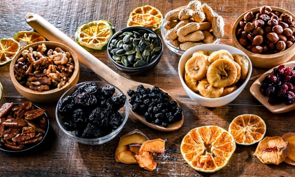 Composition with a variety of dried fruits and assorted nuts. Delicacies.