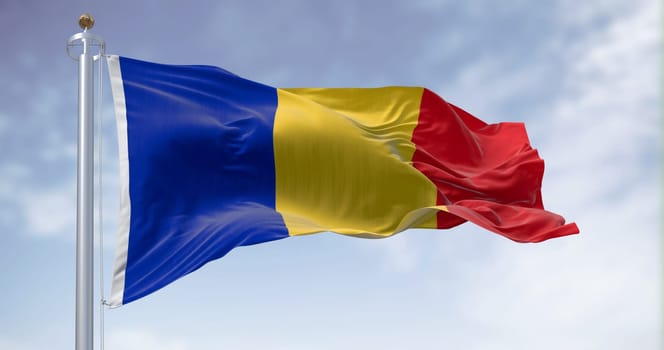 National flag of Romania waving in the wind on a clear day. Vertical tricolour of blue, yellow, and red. 3d illustration render. Fluttering fabric