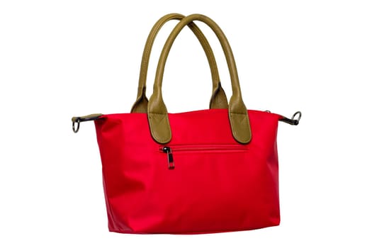 Stylish women's handbag. A fashionable female red luxury handbag isolated on white. Fashionable womans accessories. Advertising.