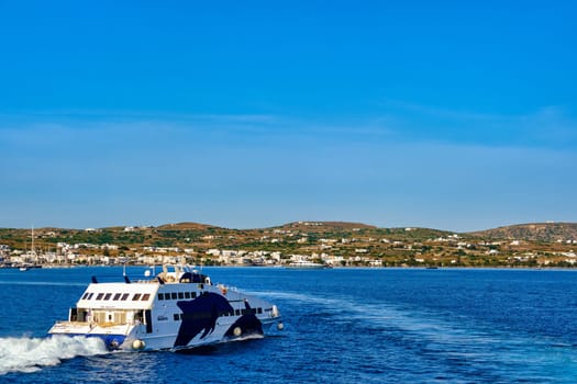 Milos, Greece - May 26, 2019: Seajets superjet ferry heading to port of Milos island, Greece. Island hopping, sea voayge, travel and vacations.