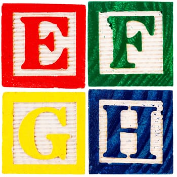 Wooden alphabet blocks isolated on white background