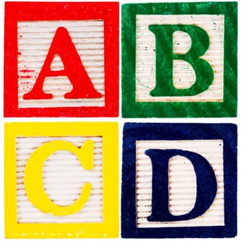 Wooden alphabet blocks isolated on white background
