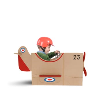 Child flies with his plane of cardboard