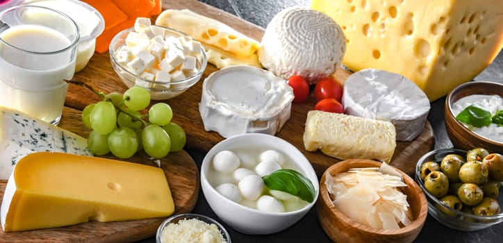 A variety of dairy products including cheese, milk and yogurt.