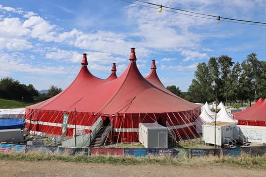It's set up for the 39th Zelt-Musik-Festival Freiburg 2023 - the big red circus tent is up and the ZMF grounds are ready for the Freiburg Cultural Summer