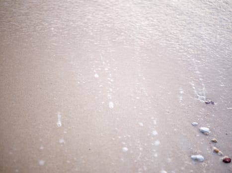 sea sand beach and summer day . Closeup of sand on beach . beach landscape. Empty tropical beach and seascape. soft sand, calmness, tranquil relaxing , summer mood . space for text