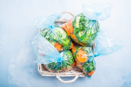 Prepared vegetable bags for freezer. Frozen food, food preservation concept