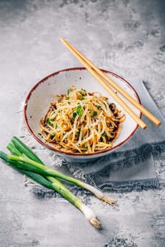 Korean bean sprout salad - spicy mung bean sprouts salad with garlic, sesame seeds, green onions and soy sauce