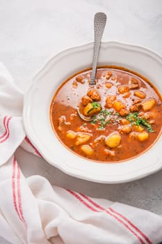 Hungarian hot goulash soup, beef, tomato, pepper, chili, smoked paprika soup. Traditional Hungarian dish.