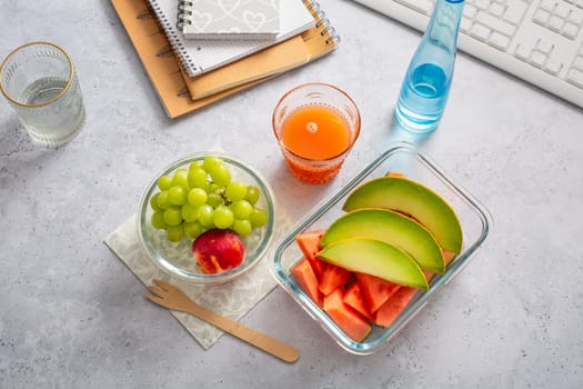 Healthy snack at office workplace, organic vegan meals from take away lunch box
