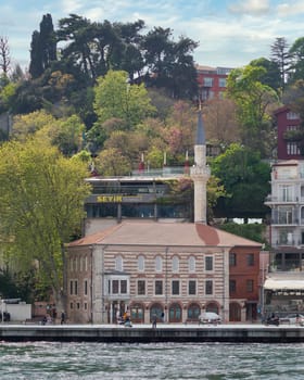 Istanbul, Turkey - May 8, 2023: View from Europian side of Bosphorus Strait overlooking T. C. Sariyer Muftulugu Volume Kemalettin Mosque, suited at Rumeli Hisari district