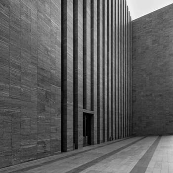 Black and white of side facade of Ataturk Cultural Center, a concert hall, theatre and cultural centre located on the eastern side of Taksim Square in Beyoglu, Istanbul, Turkey