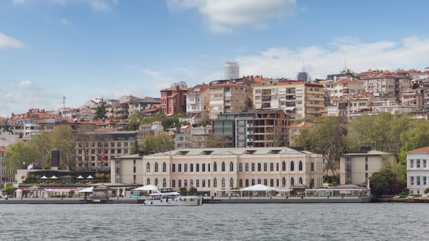 Istanbul, Turkey - May 8, 2023: Exterior of modern architectural design five stars Four Seasons hotel, suited by Bosphorus Strait, at Besiktas district, in a spring day