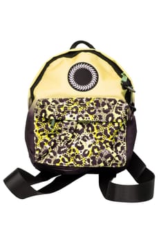Closeup of a colorful yellow comfortable school backpack isolated on a white background. Concept back to school. Macro.