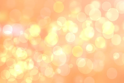 A festive abstract delicate golden yellow orange gradient background texture with glitter defocused sparkle bokeh circles. Card concept for Happy New Year, party invitation, valentine or other holidays.