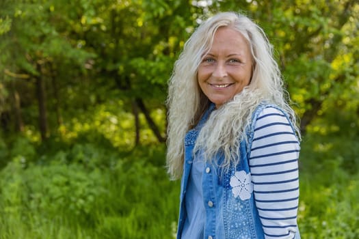 Beautiful elderly Lady with long curly hair.