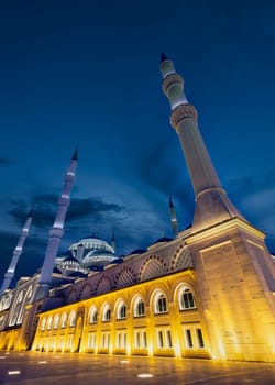 Low angle night shot of Grand Camlia Mosque, or Buyuk Camlica Camii, a modern complex for Islamic worship, built in 2019, located in Camlica hill in Uskudar district, Istanbul, Turkey, in a spring day