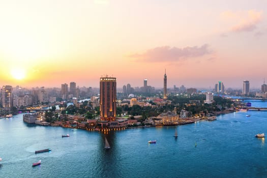 Cairo aerial panorama, the Nile with modern buildings, sunset view, Egypt.