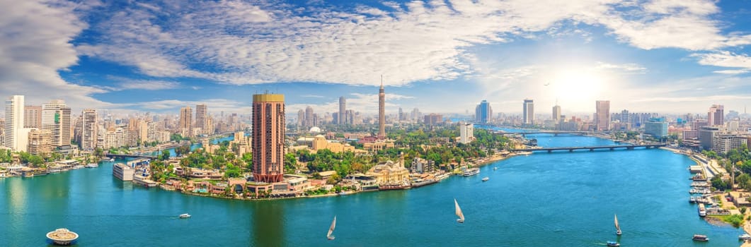 Panorama of Cairo downtown with the Tower and fashionable hotels in the harbour of the Nile, Egypt.