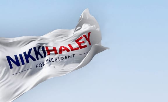 Washington D.C., US, June 15 2023: Nikki Haley 2024 presidential election campaign flag waving in the wind on a clear day. Illustrative editorial 3d illustration render