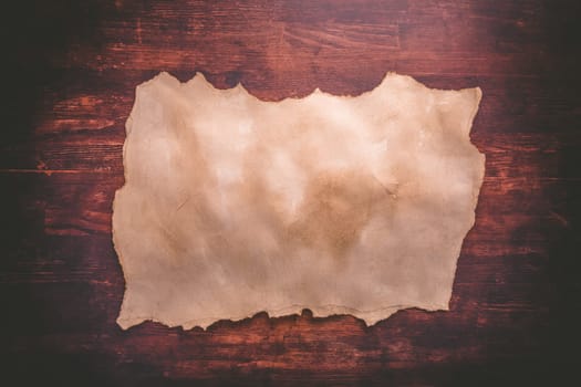 Old paper on brown wood texture with natural patterns
