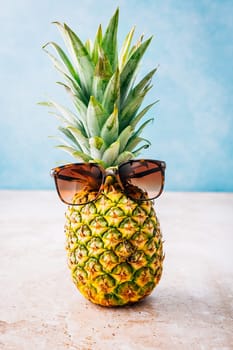 Summer concept - Pineapple hipster in sunglasses, creative art fashionable vacation concept