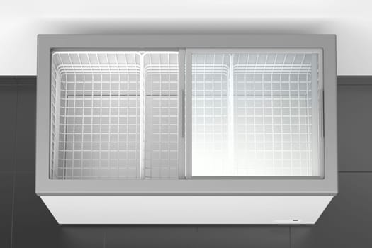 Empty glass door chest freezer in supermarket, top view