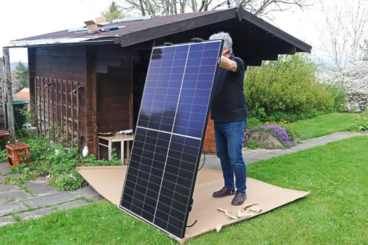 A man wants to mount a small solar system on a garden shed