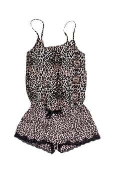 Night gown isolated. Close-up of female sexy silk night lingerie top and panties with leopard pattern isolated on a white background. Fashionable night wear or nighties.